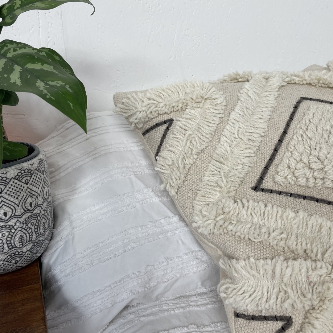 Textured Cream square cotton and wool cushion with black accent stitching 50cm x 50cm