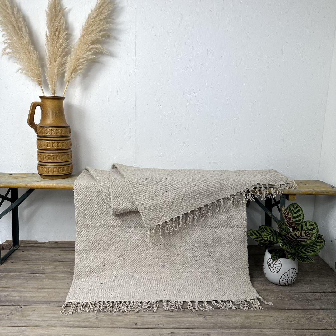 Plain cotton rugs with fringed edges in yellow or natural, handloomed using recycled yarn 180cm x 245cm