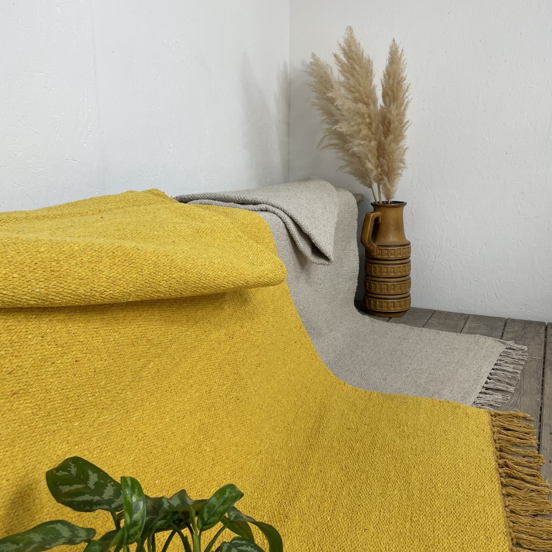 Plain cotton rugs with fringed edges in yellow or natural, handloomed using recycled yarn 180cm x 245cm