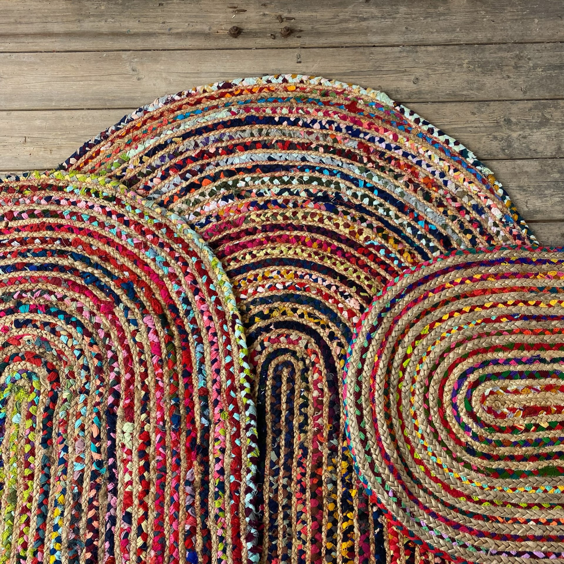 Colourful and hard wearing chindi cotton and jute oval rug for home