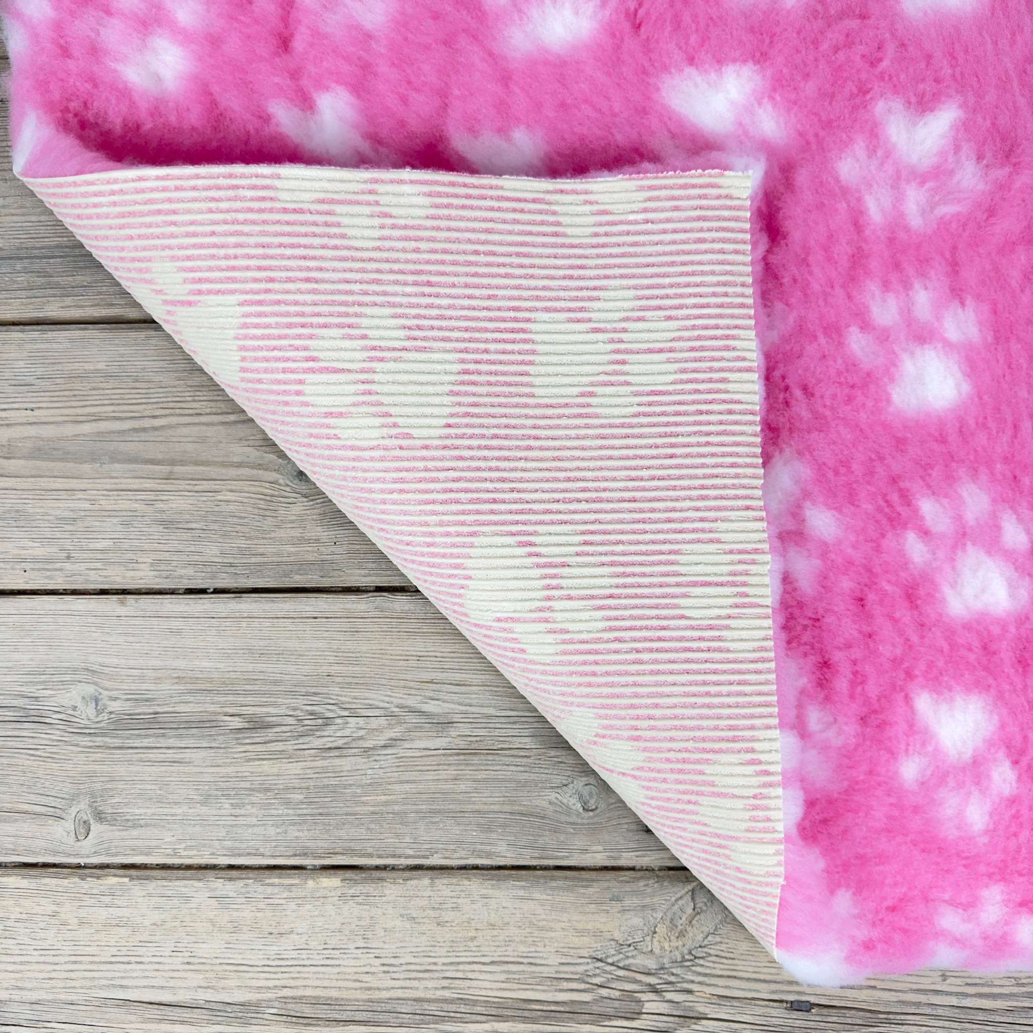 Pink Paw Non Slip Vet Vet bed cut in squares and rolls